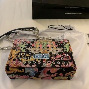 Versace purse . Worn once, but I still have the tags and paperwork.